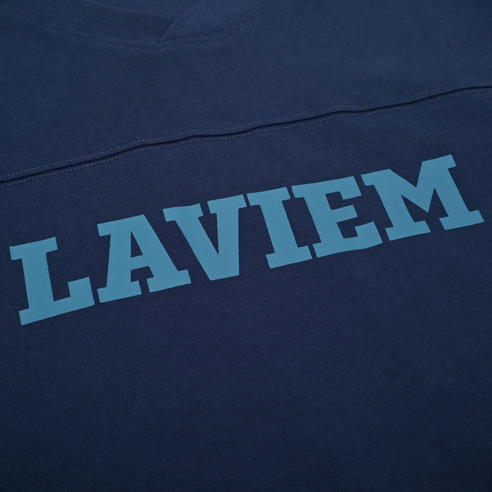 Navy blue fabric with 'LAVIEM' printed in light blue