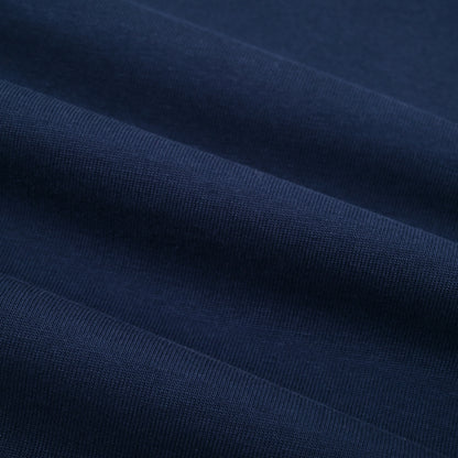 Close-up of dark blue fabric with visible texture