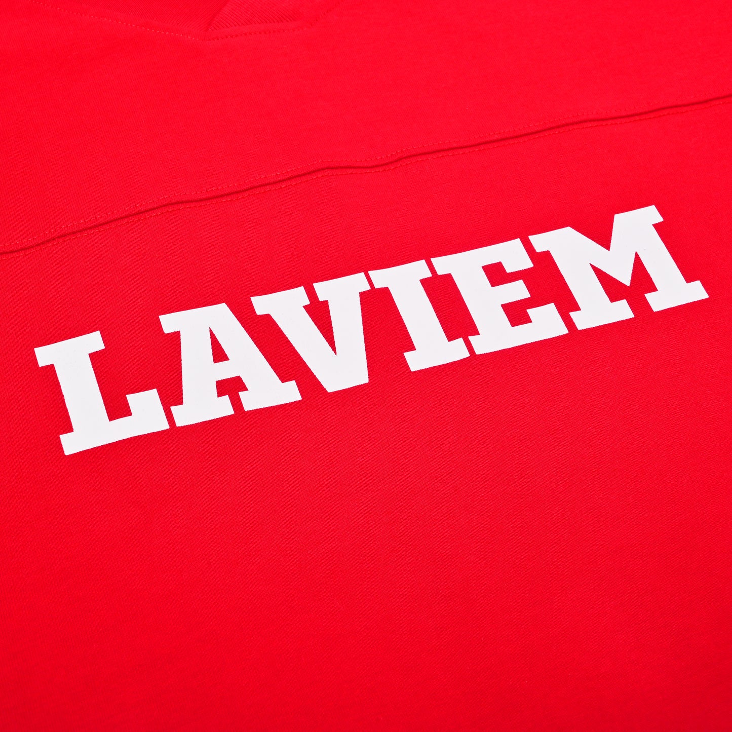 Red fabric with 'LAVIEM' printed in white letters