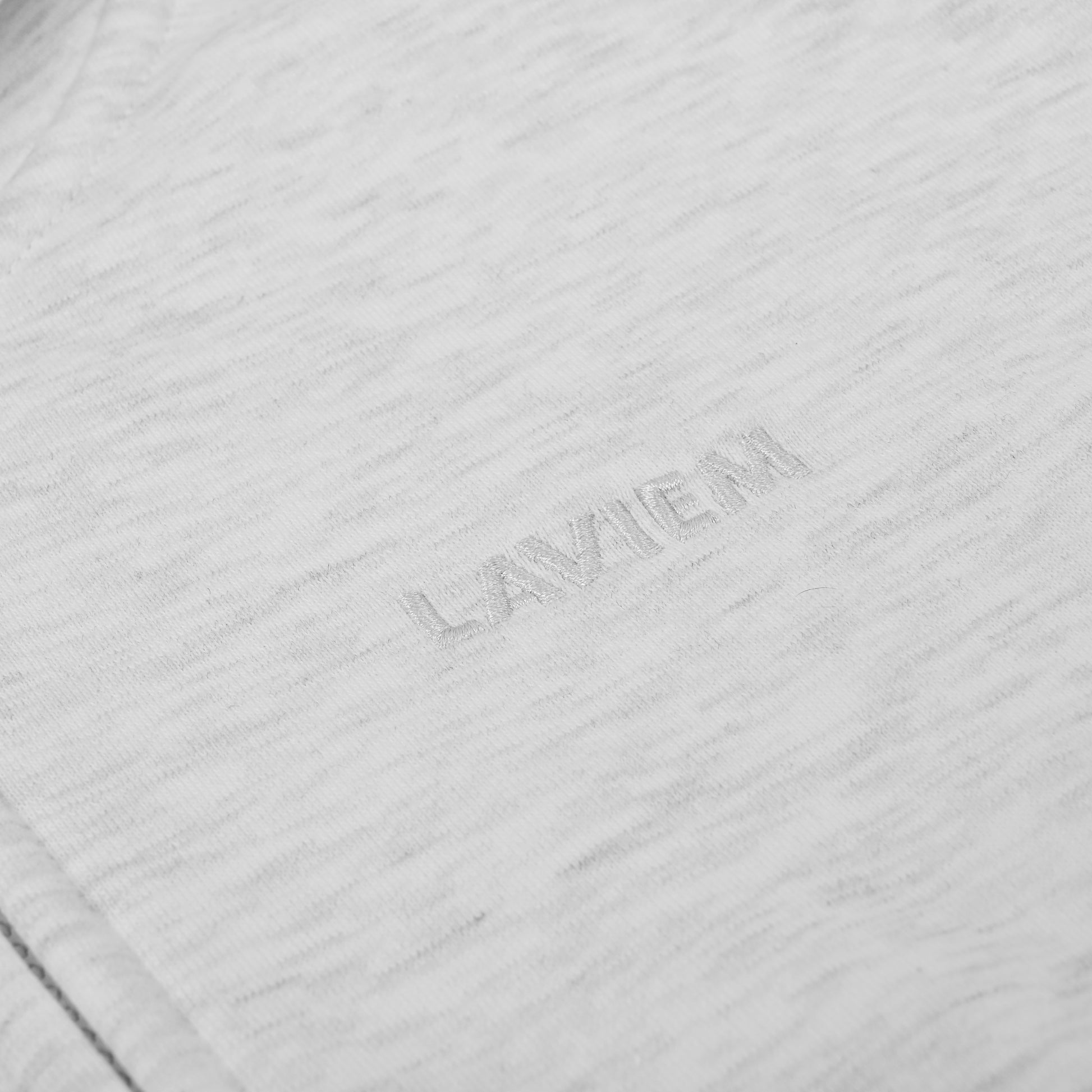Close-up of a textured fabric with 'Lavie' branding.
