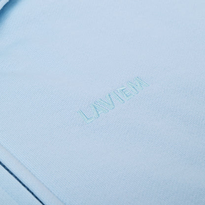 Close-up of a light blue product with 'LAVIEM' branding.